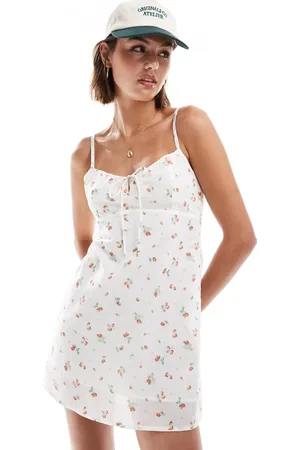 Cotton On Cotton On mini cami dress with rushing in strawberry ditsy print