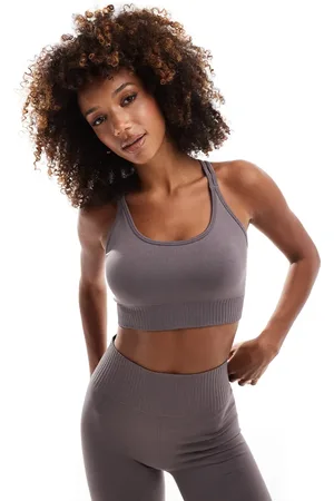 ASOS Seamless multi strap medium support sports bra with removable padding in violet