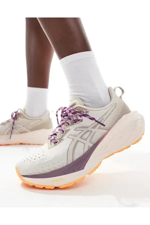 Asics Novablast 4 TR trail running trainers in beige and pink