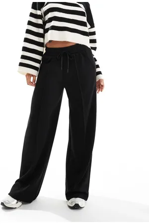 Bershka Tie waist wide leg joggers in black