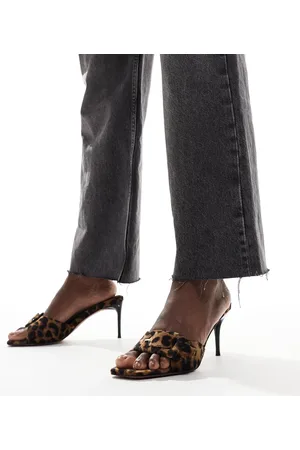ASOS Hellish buckle detail mid heeled mules in leopard