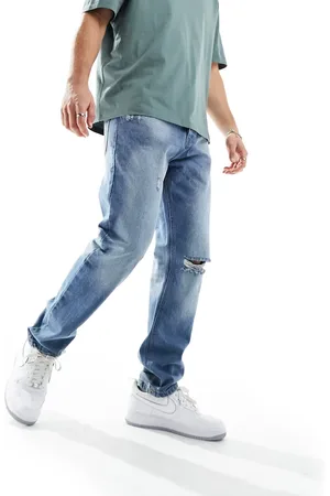 Good For Nothing Jeans in mid wash with knee rip