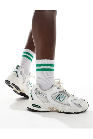 New Balance 530 trainers in & green