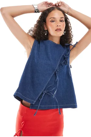 Ghospell Teo asymmetric bow top in dark denim