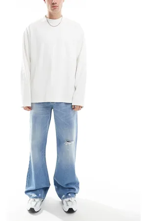 ASOS Wide flare jeans in mid wash with tint & rips
