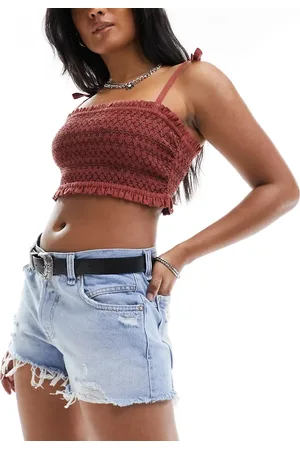 Free People Classic distressed shorts in mid wash