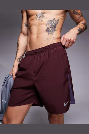 Nike Challenger Dri-FIT 7 inch shorts in burgundy