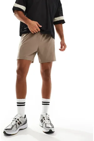 ASOS Ripstop running shorts with zip side pockets in taupe