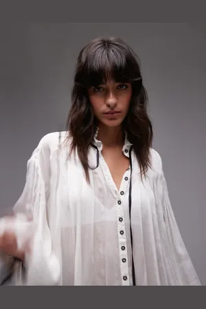 Free People Bow-detail oversized blouse in ivory