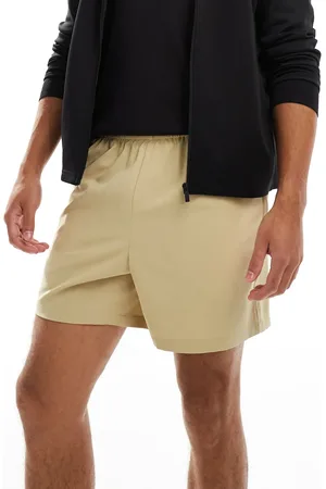 ASOS Icon 5 inch quick dry training shorts with zip pockets in sand