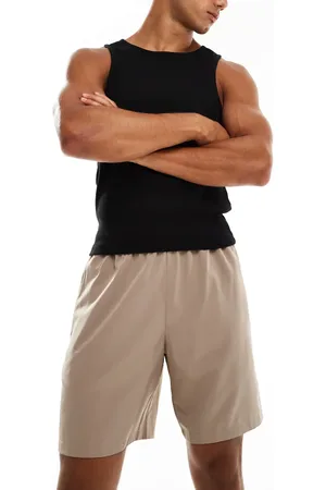 ASOS Icon 7 inch quick dry training shorts with zip pockets in taupe