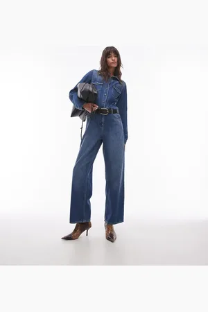 Topshop Denim slim fit jumpsuit in mid