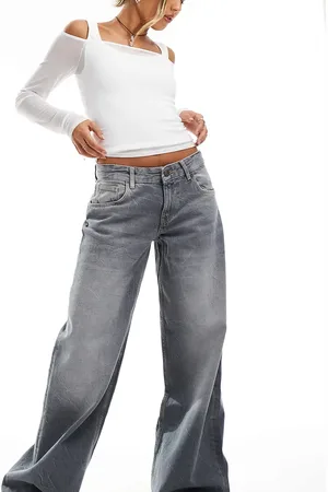 Bershka Petite wide leg baggy jeans in dirty wash