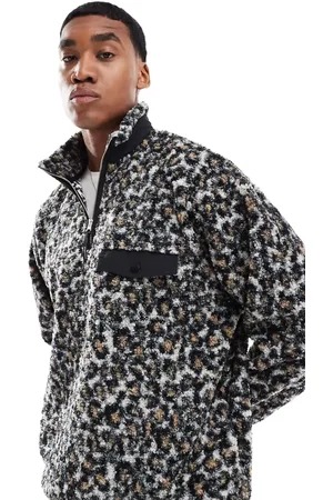 ASOS Oversized half zip sweatshirt in borg leopard print