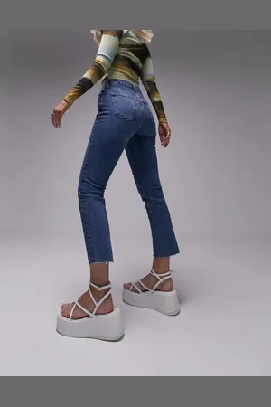 Topshop Cropped mid rise straight jeans with raw hems in mid