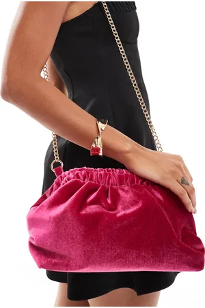 True Decadence Velvet clutch bag in dark