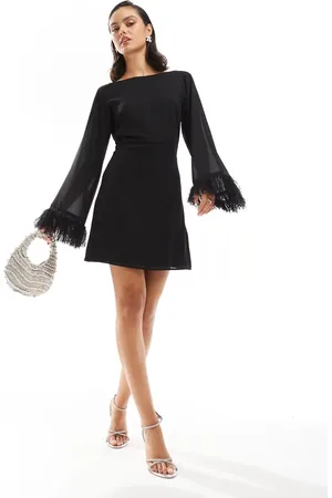 TFNC Long sleeve mini dress with faux feather cuffs in