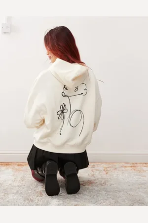 Reclaimed Oversized boxy hoodie with sketchy face print in ecru