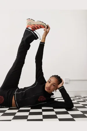 COLLUSION Zip through fitted top with varsity logo co-ord