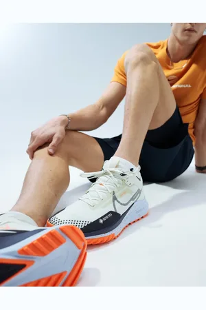 Nike ReactX Pegasus Trail 4 GORE-TEX trainers in off white and orange