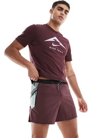 Nike Trail logo 5 inch shorts in burgundy