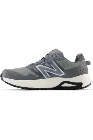 New Balance 410 running trainers in dark