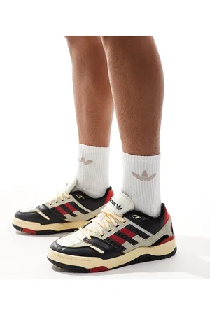 adidas Torsion Phantom Low trainers in off , black & red