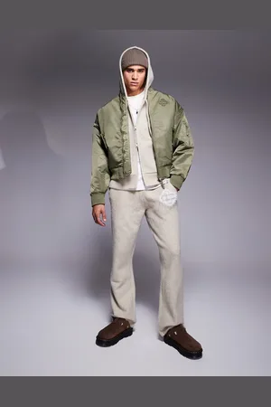 The Couture Club Oversized emblem bomber jacket in khaki