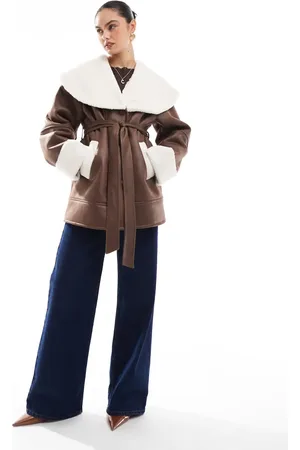 The Frolic X Bella Stovey exclusive faux shearling and cream borg contrast belted coat in