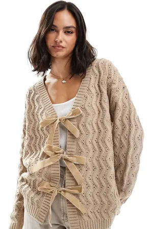 Miss Selfridge Cable longerline cardigan with velvet bow detail in camel