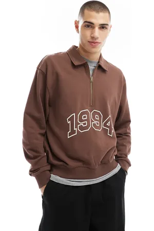 ASOS Boxy oversized polo sweatshirt with print and tipping detail in