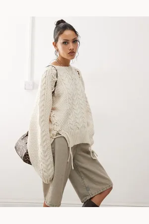Monki Chunky cable knitted sweater with tie details in off melange
