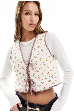 The Frolic Exclusive strawberry print reversible quilted gilet in