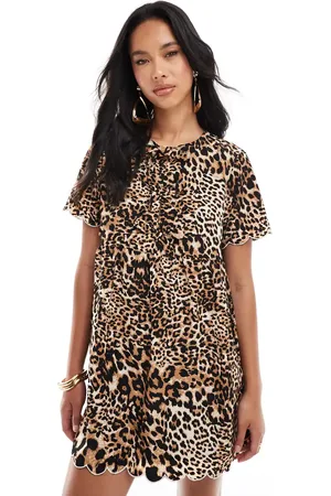 The Frolic Exclusive bow detail scallop trim mini dress in leopard