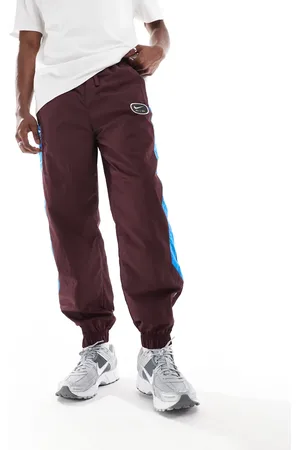 Nike Swoosh Air woven joggers in and blue