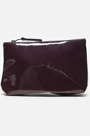 Rains Waterproof cosmetic bag in burgundy shine exclusive to asos