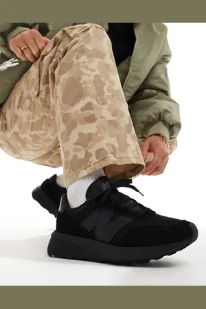 New Balance 370 trainers in triple