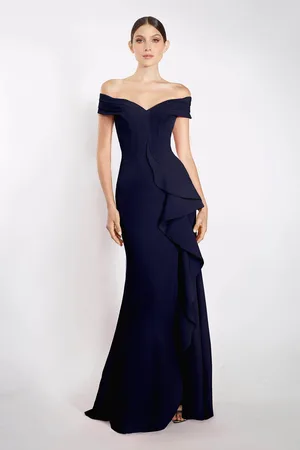 Janique K6876 Off Shoulder Ruffle Slit Trumpet Gown