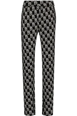 We11 Done Monogram knitted trousers
