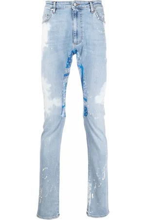 Alchemist Distressed-effect denim jeans