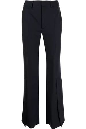 MONSE Sliced hem flared trousers