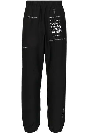 Takahiromiyashita The Soloist Slogan-print track pants