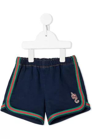 Gucci Shorts - Logo embroidered shorts