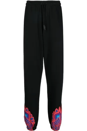 MARCELO BURLON Curves Wings track pants