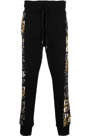 VERSACE Logo print track pants