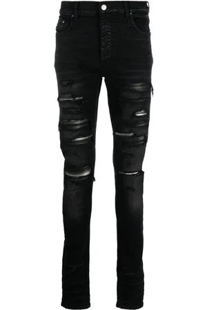 AMIRI Thrasher distressed skinny jeans