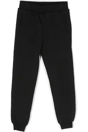 Moschino Debossed-detail branded track pants