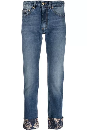 VERSACE Floral-print cropped jeans