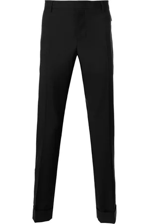VALENTINO GARAVANI Trousers with zip pockets