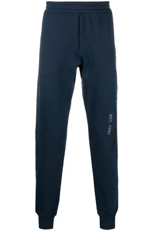Alexander McQueen Graffiti logo-print track pants